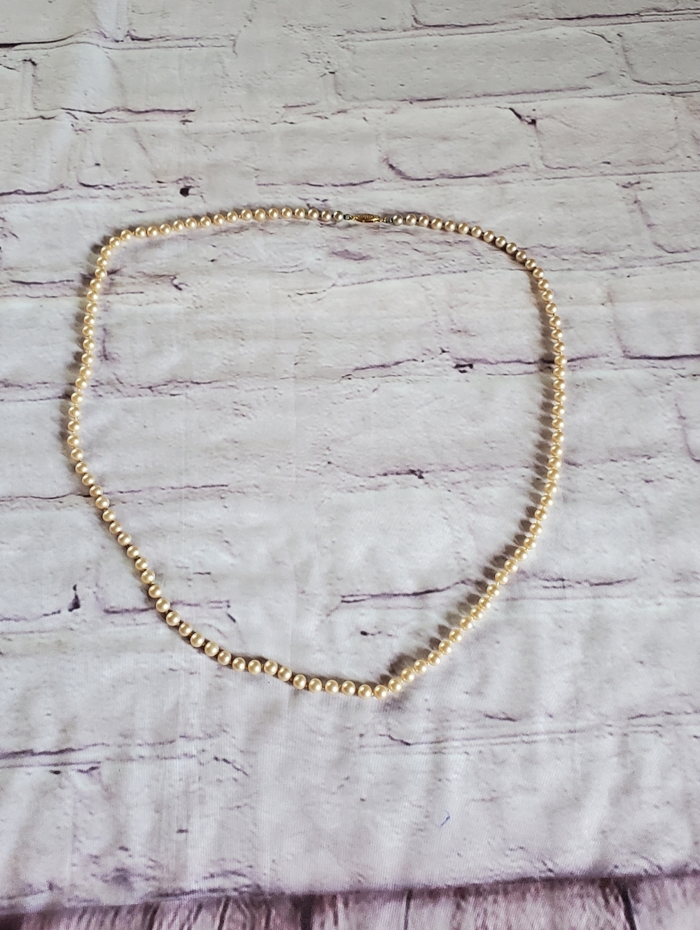 Vintage glass pearl necklace with sterling vermeil filigree clasp and hand knot